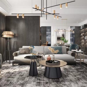 Puede incluir: Un salón moderno con un sofá gris claro, dos mesas auxiliares negras y una mesa de centro redonda. La habitación cuenta con una alfombra estampada, un sillón azul y una lámpara de pie con pantalla dorada. Hay varias lámparas en el techo.