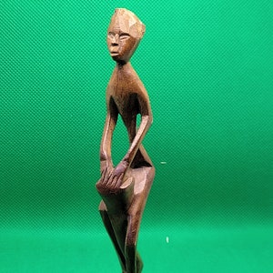 Stylized African Hand-carved Man with a Drum