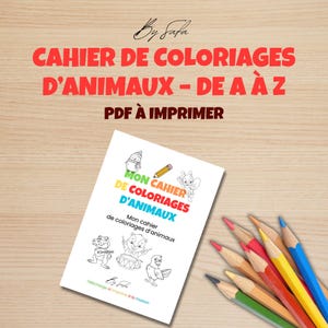 May include: A white coloring book titled "My Animal Coloring Book" with cartoon animal illustrations and the text "Coloring Book of Animals - From A to Z". Colored pencils in various colors are arranged on a wooden surface.
