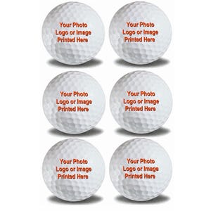 May include: Six white golf balls with the text "Your Photo Logo or Image Printed Here" in orange.