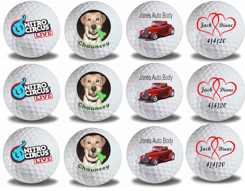 May include: Nine white golf balls with different designs. Three golf balls feature a logo for Nitro Circus Live. Three golf balls feature a dog with the name Chauncey. Three golf balls feature a red car with the text Jones Auto Body and a heart design with the text Jack Diane and the date 4/4/20.
