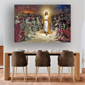 May include: A painting depicting Jesus Christ standing in the center of a group of people. The people are kneeling and looking up at Jesus. The painting is set against a backdrop of a sunset.