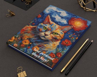 May include: A blue notebook with a colorful painting of a cat with green eyes. The cat is surrounded by flowers and the text "Your personal touch here!" is printed on the cover.