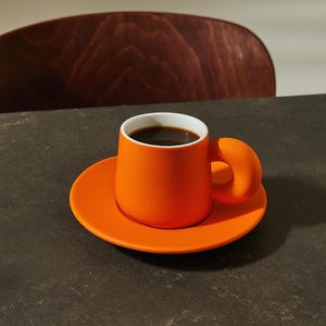 Vibrant Orange Ceramic Espresso Cup with Saucer2.4ozModern Coffee Mug with Crescent Handle – Bold Minimalist Aesthetic Giftfor Coffee Lovers