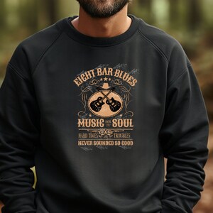 Cozy, black sweatshirt crafted from soft, high-quality cotton + polyester material. guitarist gift guitar lover graphic sweatshirt