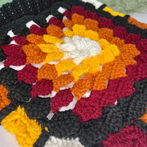 Cartable multicolore à fleurs 3D