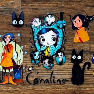 May include: A clear sheet of Coraline-themed stickers featuring various illustrations of the character with blue hair, a yellow raincoat, a black cat, a skeleton key, and other figures. The word Coraline is printed in black script at the bottom.