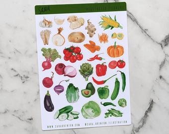 May include: A sheet of stickers featuring watercolor illustrations of various vegetables, including garlic, onions, tomatoes, peppers, cucumbers, and more. The stickers are arranged in a grid pattern on a white background. The sheet is labeled "Saara - Vegetable Illustrations".