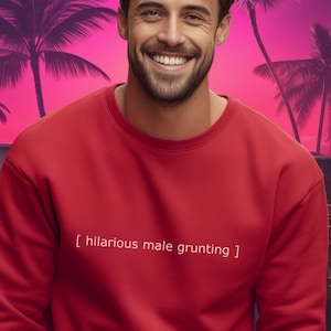 May include: A red sweatshirt with the text "[hilarious male grunting]" printed on the front.