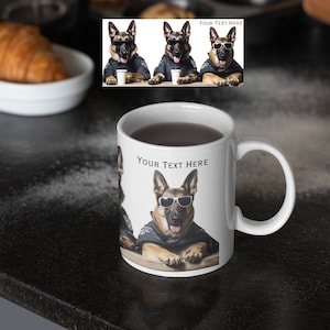 May include: White ceramic mug featuring a brown German Shepherd dog wearing sunglasses and a police officer's uniform. The text "YOUR TEXT HERE" is printed on the mug.