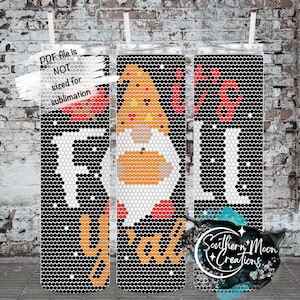 May include: A sublimation design featuring a gnome with a pumpkin and the word "Fall" in black and white on a black background with a white polka dot pattern.