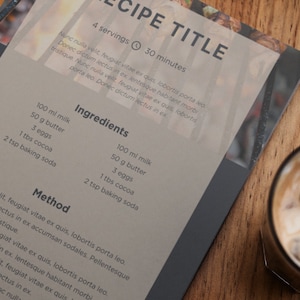 Printed Canva recipe page in dark modern design with minimalist layout, sleek fonts, and space for ingredients and cooking steps