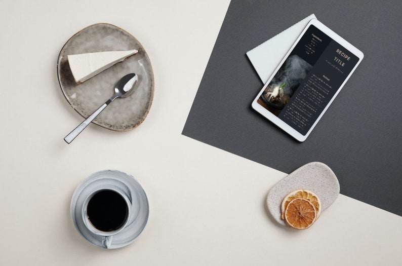Digital recipe book shown on tablet, editable Canva format for easy customization and instant download.