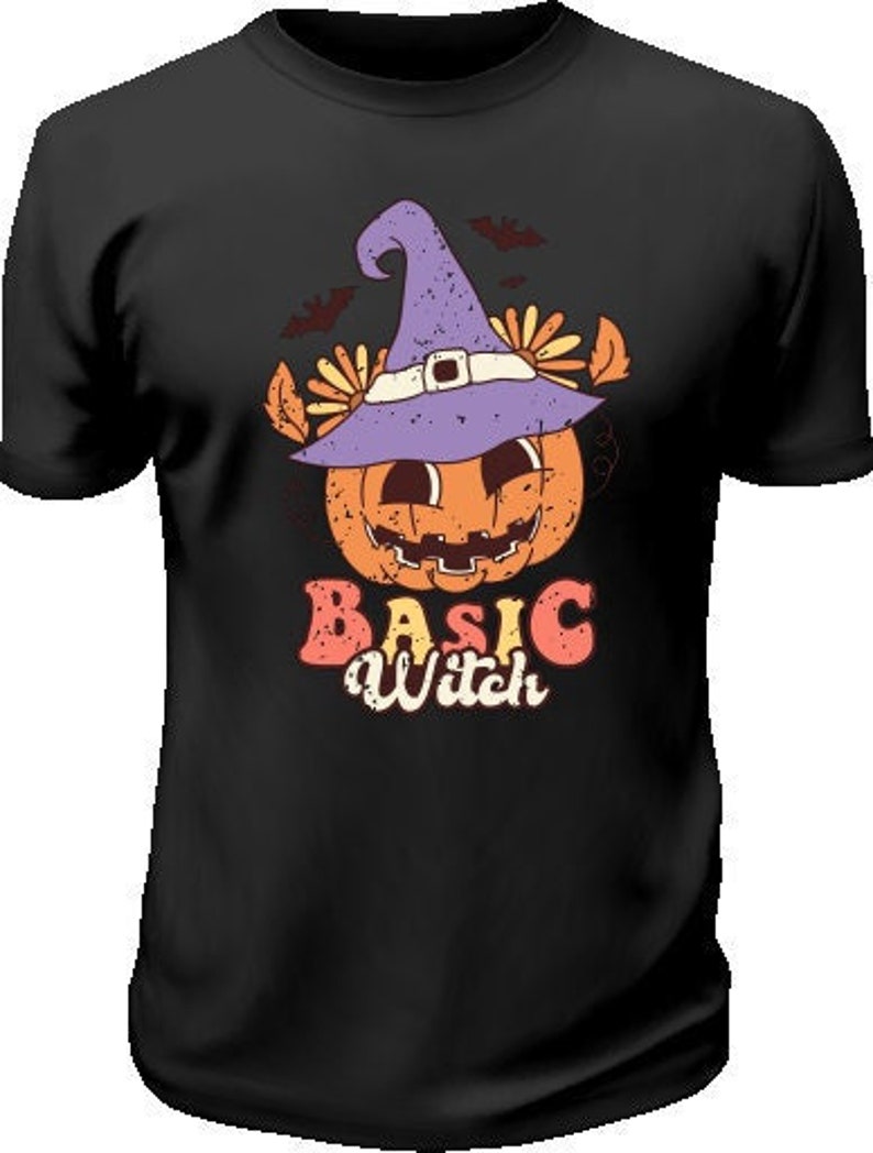 May include: Black t-shirt featuring a graphic of a pumpkin wearing a purple witch's hat with a black brim and a flower on the side. The text "BASIC Witch" is below the pumpkin.