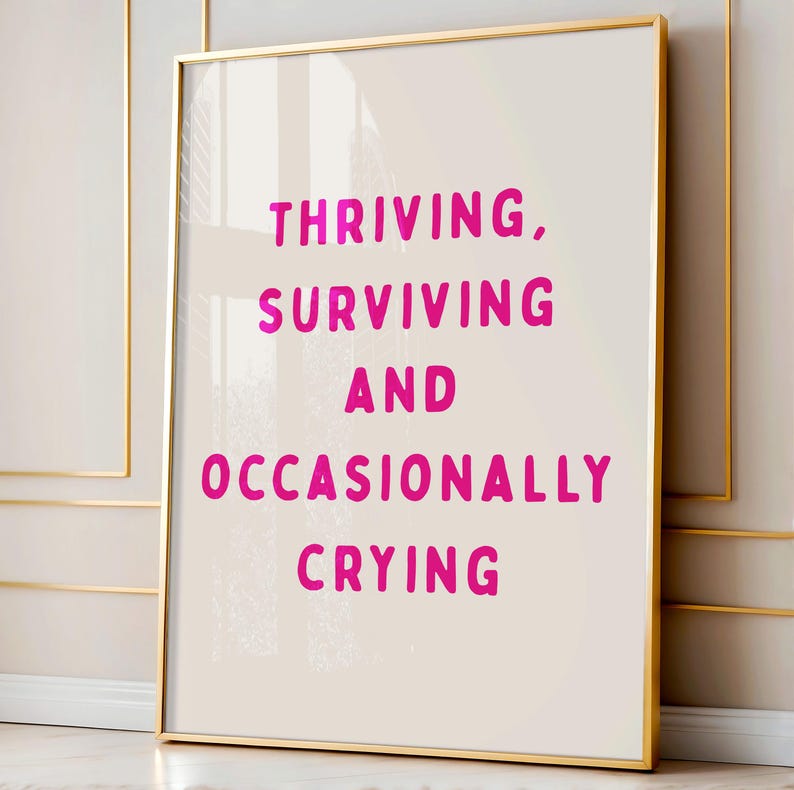 thriving, surviving, and occasionally crying wall art