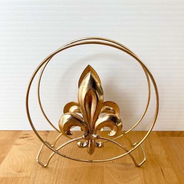 Goldtone Fluer de lis napkin holder