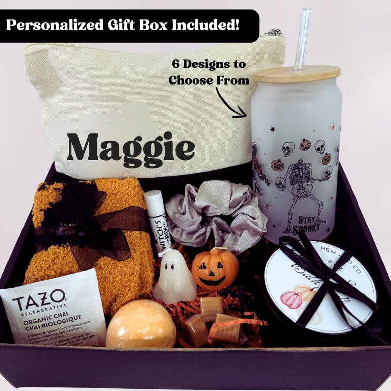 Halloween Lover Boo Gift Box that comes with a personalized box, custom canvas makeup bag, socks, tea, a ghost and pumpkin candle, bath salts, a bath bomb, custom glass cup, and a scrunchie!