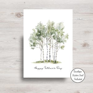 May include: A white greeting card with a watercolor illustration of birch trees. The trees have white bark with black markings and green foliage. The text "Happy Father's Day" is written in a cursive font.