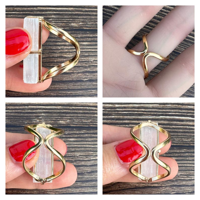 May include: A ring featuring a vertical, rectangular, translucent white selenite crystal bar set within a polished gold-tone metal frame. The band consists of two curved, wave-like metal wires that meet at the centre to hold the crystal securely.