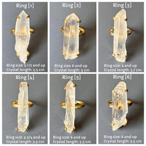 May include: Six gold rings, each with a clear quartz crystal. The rings vary in size and crystal length, with the longest crystal measuring 3.7 cm. Each ring is labelled with a ring size and crystal length.