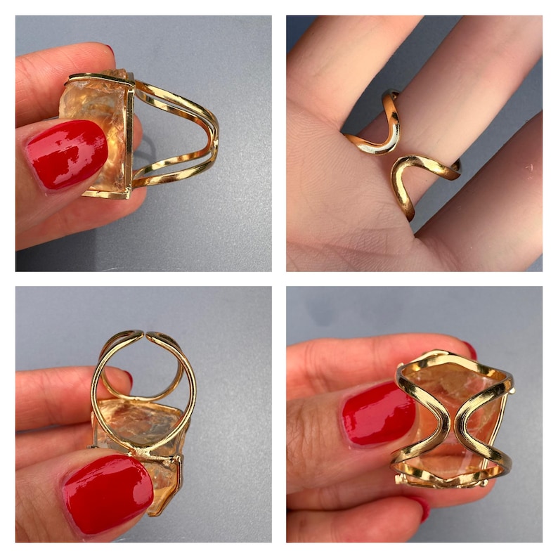 May include: Gold-toned ring with a rectangular, light-colored stone. The ring features a unique design with a double band and a decorative frame around the stone. The ring is shown from multiple angles.