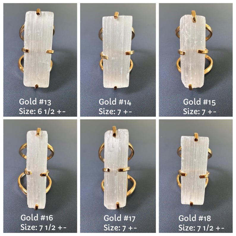 May include: Six gold-toned rings featuring rectangular, translucent white selenite crystals held by four prongs. Each ring is labelled with a number from 13 to 18 and a corresponding US ring size ranging from 6 1/2 to 7 1/2.