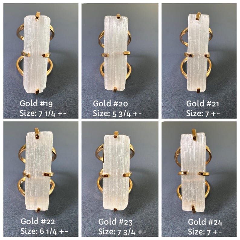 May include: Six gold-toned rings featuring rectangular white selenite stones held by four prongs. Each ring is labelled with a number and a US size: Gold #19 size 7 1/4, #20 size 5 3/4, #21 size 7, #22 size 6 1/4, #23 size 7 3/4, and #24 size 7.