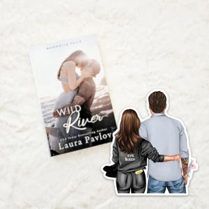 May include: A sticker featuring a couple in a romantic pose. The woman is wearing a black jacket with the words "Evil Queen" on the back. The man is wearing a light blue shirt and jeans. The sticker is set against a white background with a book titled "Wild River" by Laura Pavlov.
