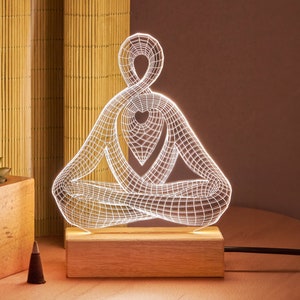 Décoration lumineuse de méditation comme cadeau de méditation. Lampe Bouddha en cadeau de yoga. Lumière de Bouddha comme décoration de méditation. Cadeaux yoga pour elle