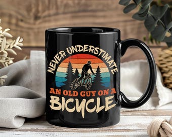Kubek „Nigdy nie lekceważ mężczyzny z rowerem”, zabawny kubek do kawy z motywem kolarstwa górskiego, prezent dla kolarza górskiego, prezent na Dzień Ojca dla taty kolarza, kubek dla rowerzysty