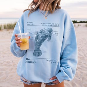 Manatee Sweatshirt Oceancore Manatee Gifts Coconut Girl Nature Stuff Environmental Gifts Marine Biology Manatee Sweater Mermaidcore Gorpcore Light Blue