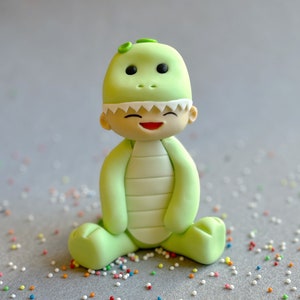 Dinosaur fondant cake topper for birthday cake