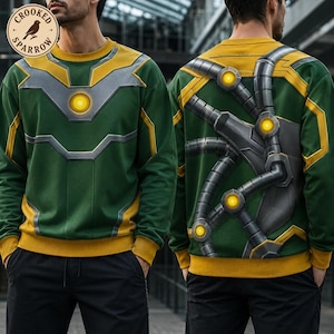 May include: A green long-sleeve sweatshirt featuring a graphic print of a mechanical suit. The front displays a yellow glowing circular chest piece with silver armor plating. The back shows metallic tentacles with glowing yellow joints.