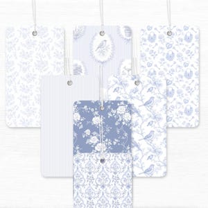 Le Jardin Secret French toile digital paper collection in soft blue and white, featuring elegant floral and bird patterns, ornate damask motifs, hydrangeas, vintage cameos, and a romantic French love seat surrounded by flowers. A delicate watercolor grandmillennial-style paper set perfect for scrapbooking, junk journaling, invitations, and shabby chic craft projects.