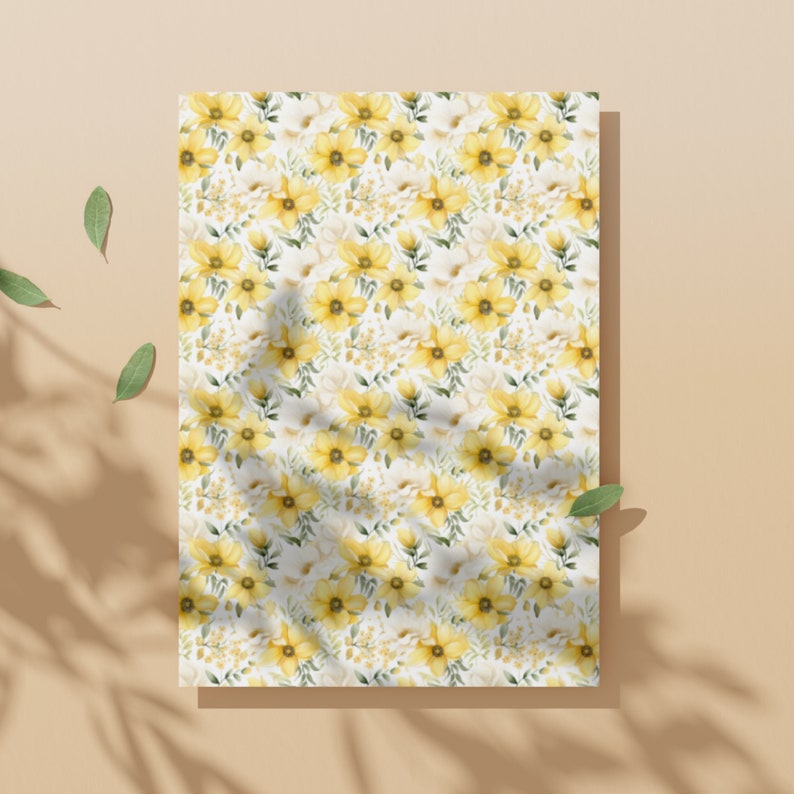 May include: A seamless pattern featuring yellow watercolor flowers with green leaves on a white background. The pattern is perfect for crafting, scrapbooking, and other creative projects.