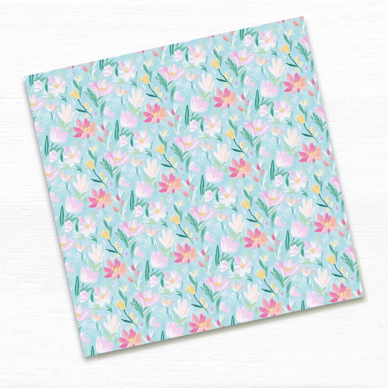 Whimsical and vibrant ditsy floral pattern with bright spring flower heads in various colors, creating a seamless and lively design