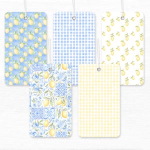 Pastel watercolor seamless pattern featuring Sicilian lemons, Amalfi Coast–inspired stripes, Santorini-style Mediterranean tiles, and delicate fruit motifs. Soft, airy colors with a hand-painted look evoke a romantic Mediterranean summer aesthetic