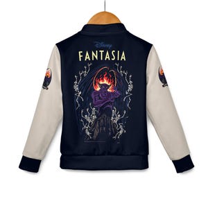 May include: Navy blue and cream-colored jacket featuring a graphic from Disney's Fantasia. The back of the jacket displays a purple demon with a fiery halo, surrounded by skeletons. The sleeves are cream-colored, and the jacket has a button-up front.