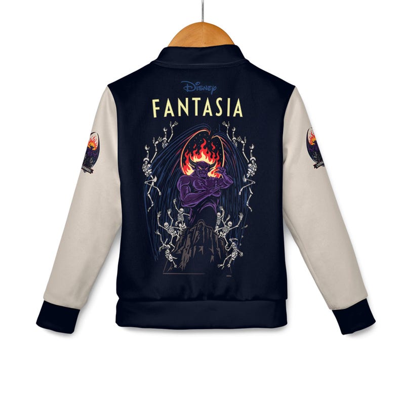 May include: Navy blue and cream-colored jacket featuring a graphic from Disney's Fantasia. The back of the jacket displays a purple demon with a fiery halo, surrounded by skeletons. The sleeves are cream-colored, and the jacket has a button-up front.