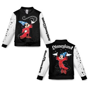 May include: Black bomber jacket featuring Mickey Mouse as the Sorcerer's Apprentice from Fantasia. The jacket has white sleeves with star accents and the text "Walt Disney World" on the sleeve. The back of the jacket says "Disneyland".