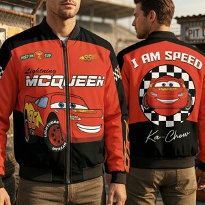 May include: Red and black bomber jacket featuring Lightning McQueen from the Cars movie. The jacket has a front zipper, the text "Lightning McQueen", "95", and "LIGHTYEAR". The back of the jacket says "I AM SPEED" and "Ka-Chow".