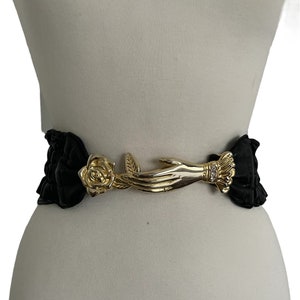 Belt with hand buckle and gold metal flower in black faux leather vintage France 90s