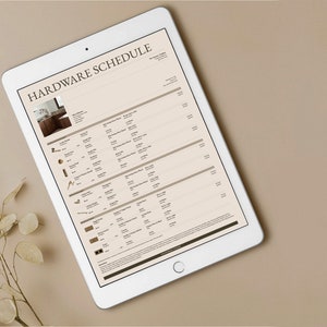 May include: A tablet screen displaying a hardware schedule with a list of different hardware items and their descriptions. The schedule includes a variety of hardware items, such as cabinet pulls, drawer pulls, hinges, and door knobs. The schedule also includes the dimensions of each item, the finish, and the price.
