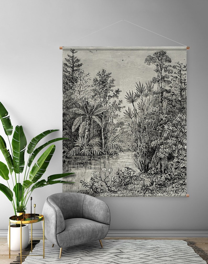 May include: Black and white illustration of a tropical jungle scene with palm trees, ferns, and a river. The illustration is printed on a tapestry hanging on a wall.