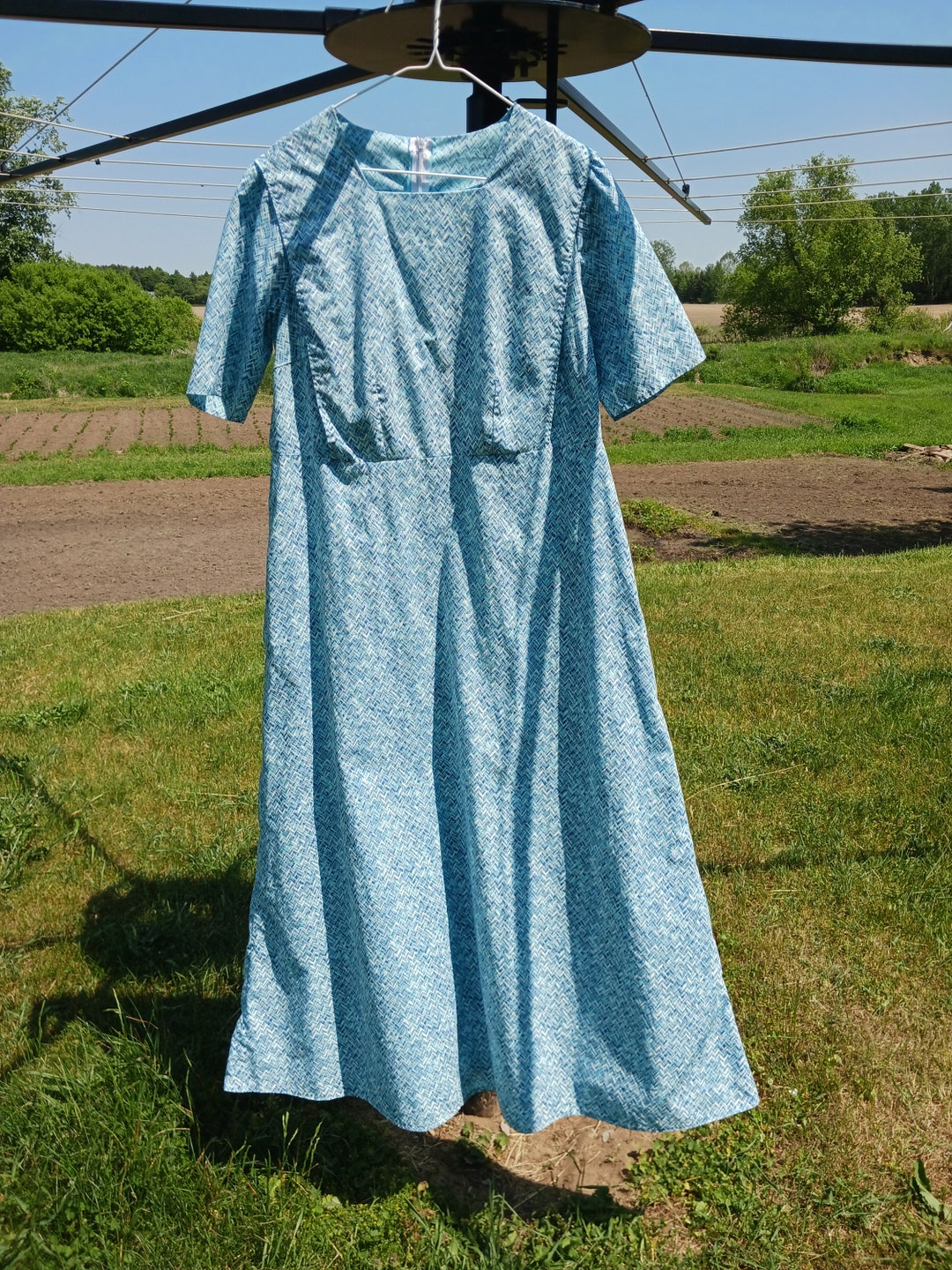 OPEN BACK LONG CAPE DRESS LEGEND HAS IT