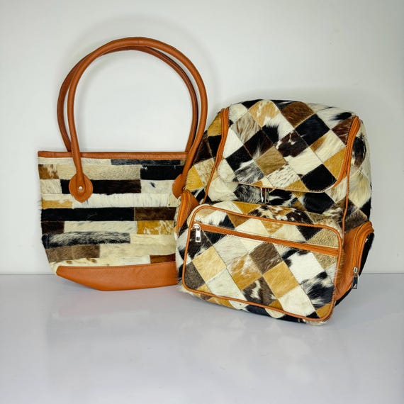 diamond cowhide leather backpack Black & Concho grain leather with hair on hide accents Speckled Brown Cowhide Diaper Backpack