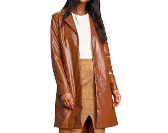 May include: A brown faux leather trench coat with a button closure and a long, straight silhouette.