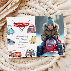 May include: A folded thank you card with a photo of a child driving a red toy car. The card features cartoon car illustrations and the text "Thank You". The message reads, "I loved the cake and the presents too, But my favorite part was seeing you! Thank you for making My birthday extra special! LOVE, Brandon."