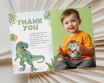 May include: A green dinosaur with a toothy grin is featured on a thank you card. The card has a blue background with green leaves and balloons. The text on the card reads "Thank You" and "I loved the cake and the presents too. But my favorite part was seeing you! Thank you for making my birthday extra special! Love, Brandon". A photo of a young boy wearing a yellow shirt with a green dinosaur on it is on the right side of the card.