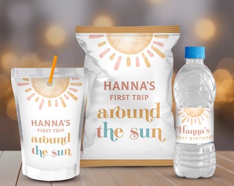 May include: A set of three party favor labels featuring a watercolor sun design with the text "Hanna's First Trip Around the Sun". The labels are designed for a juice box, a bag of chips, and a water bottle.